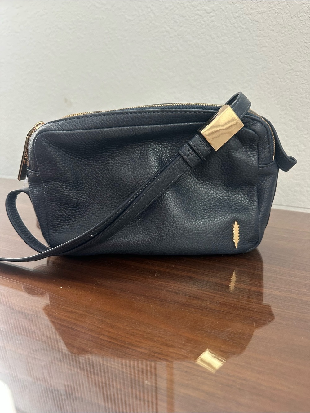 Thacker Navy Pebbled Leather Crossbody with Gold Accent